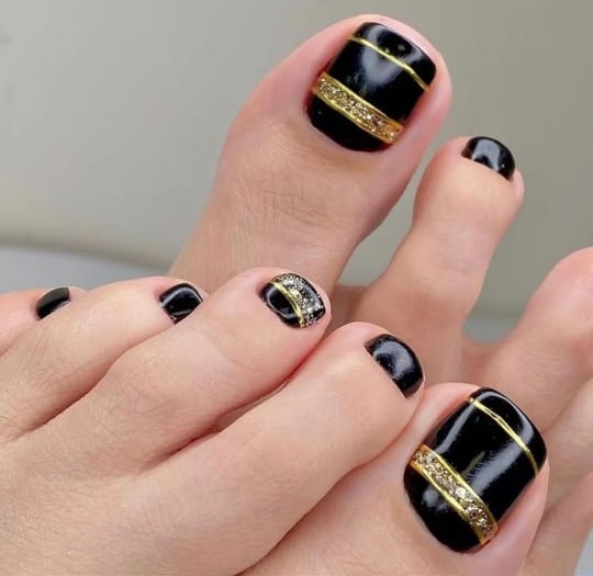 Black and Gold Toenails