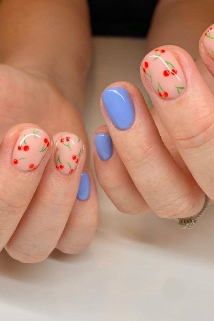 Blue shorties with Cherry Art Nails