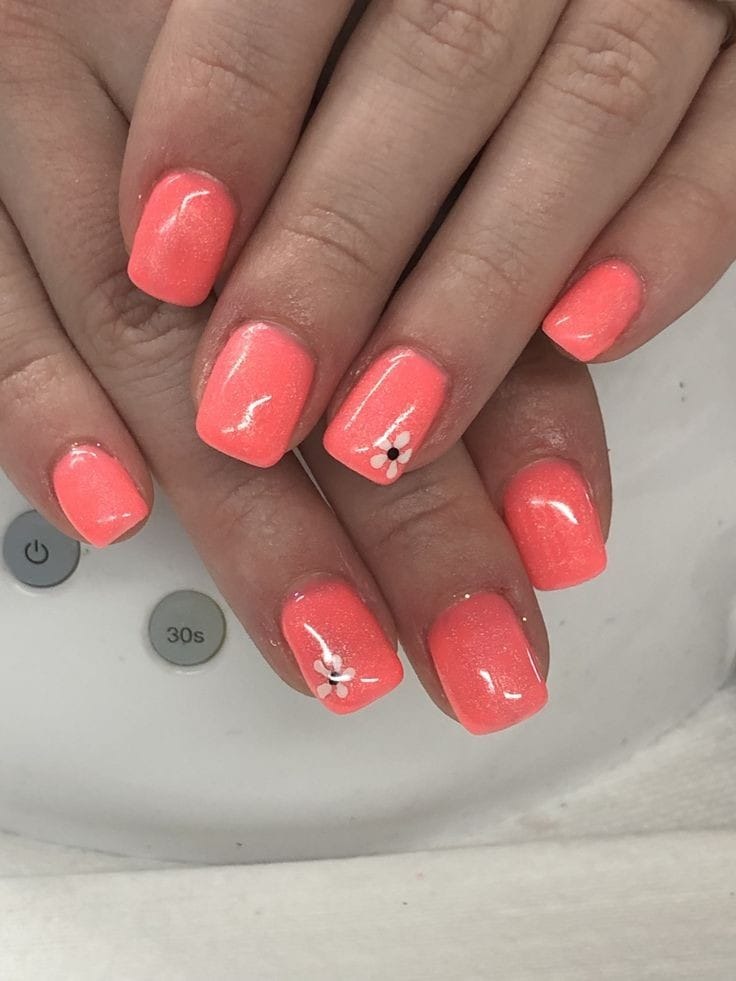 Coral Nails with a Small Flower