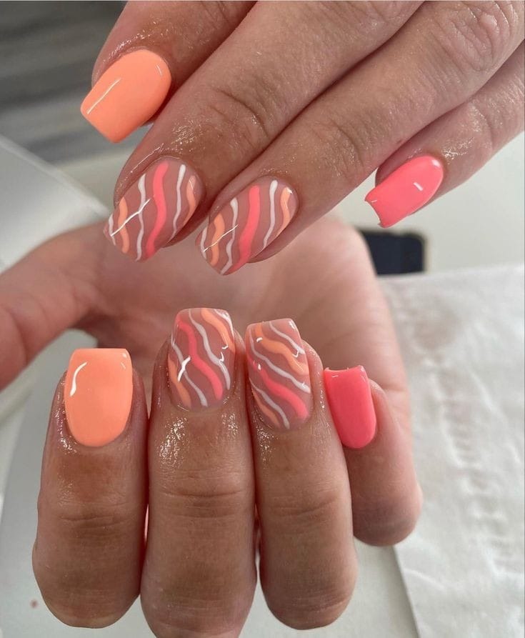 Coral and Peach Swirled Nails