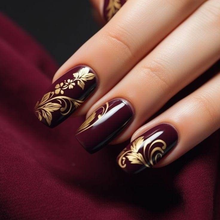 Glossy maroon with gold floral art Fall Wedding Nails