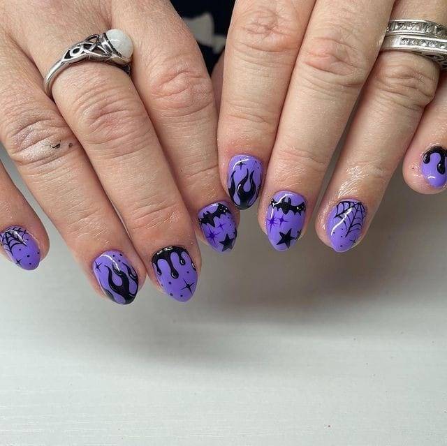 Haunted Almonds Black and Purple Halloween Nails