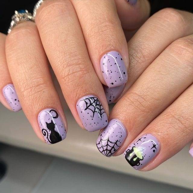 Nightmares Black and Purple Spooky Nails