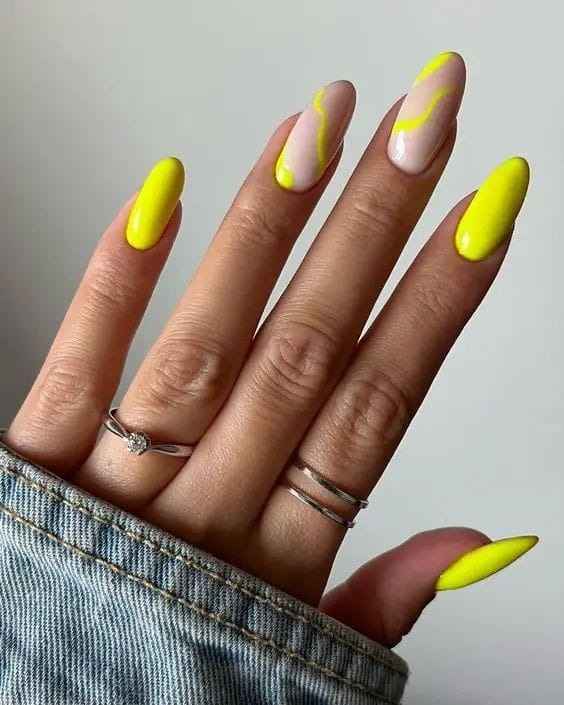 Yellow Swirled Almond Nails