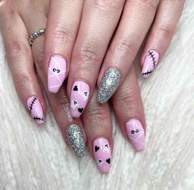 Glittery Pink Almond Halloween Nails