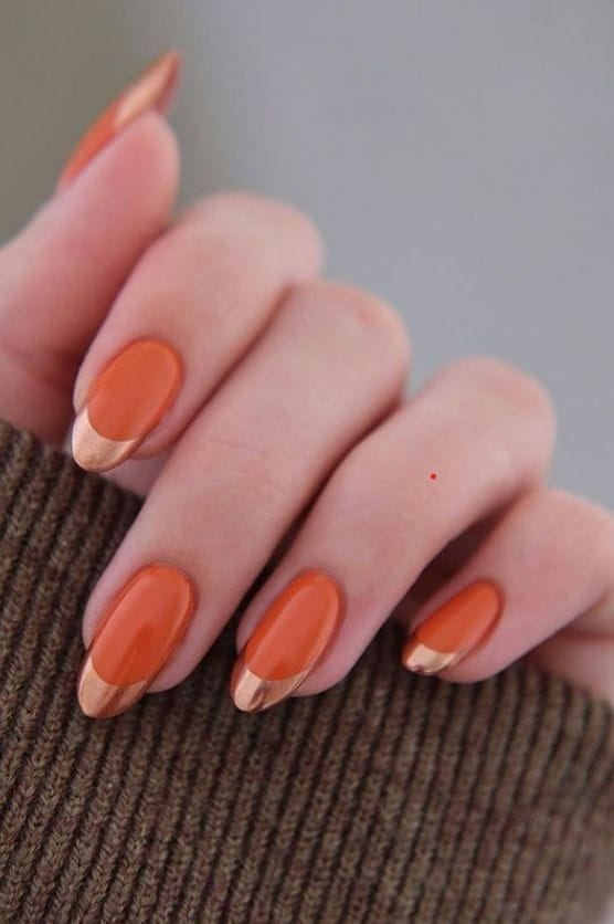 glossy burnt orange with metallic tips nails