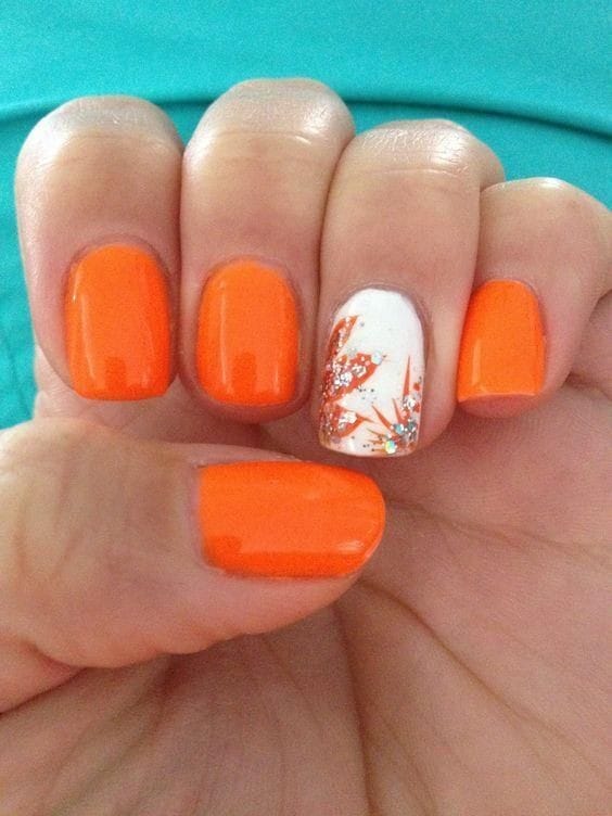  orange shorties with matte white accent nail