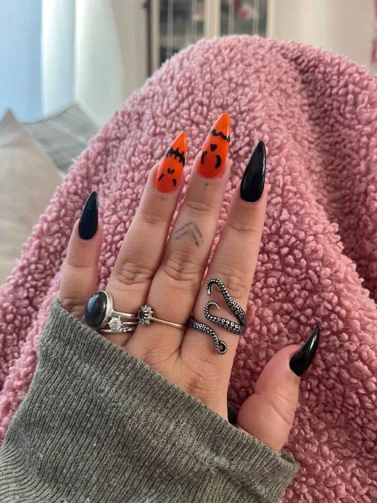 Spooky Short Stiletto orange and black halloween nails