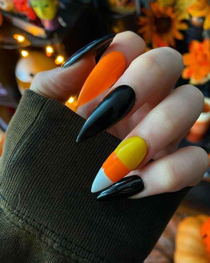 Striped Stiletto Nails orange and black halloween nails