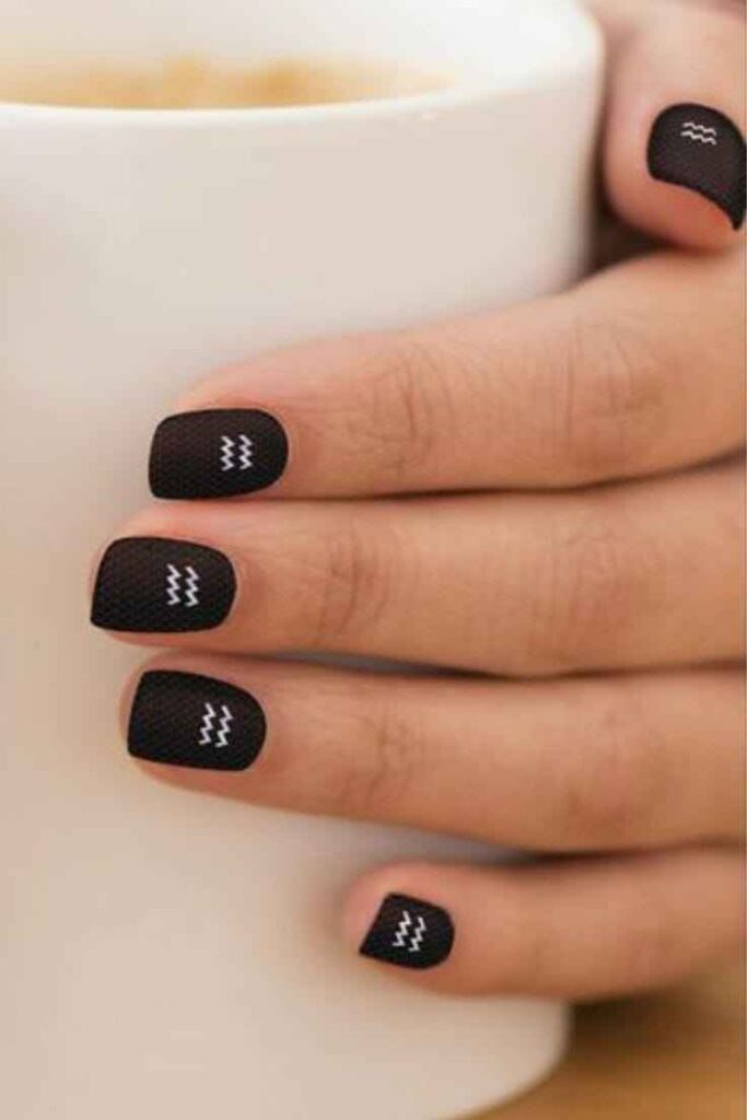 Black Textured Shorties with Water-Barrier Symbol nails