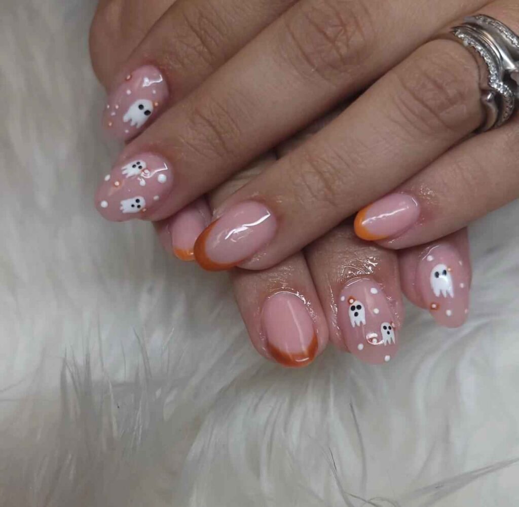 Burnt Orange Snowflakes almond nails 