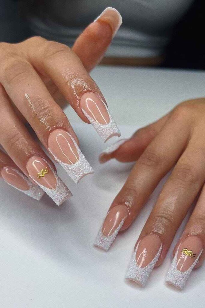 Glitter French Tips with Gold Aquarius Symbol Nail Designs