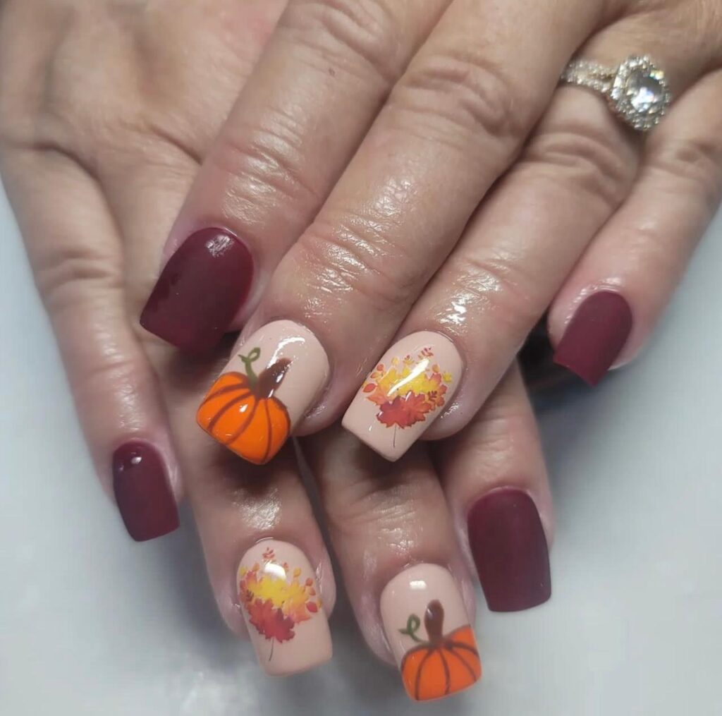 Maroon Magic pumpkin Halloween nails