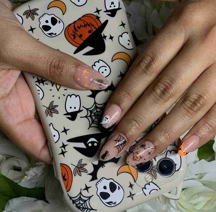 Nude Scary Elements almond nail designs