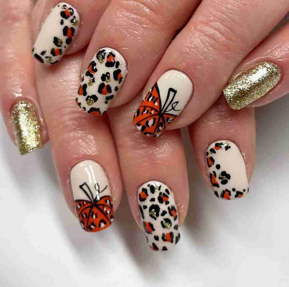 Scare & Glam pumpkin nail designs