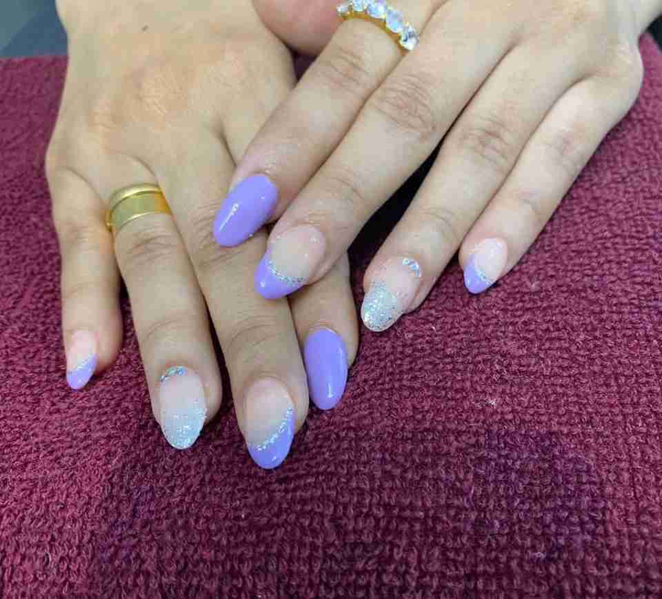 Short Round Lavender Nails with Silver Glitter Accents